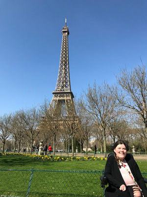 Chelsey in front of the Eiffel Tower