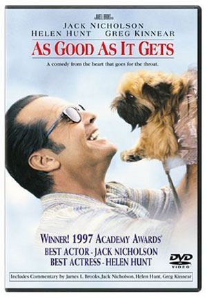 smiling Jack Nicholson holding small dog