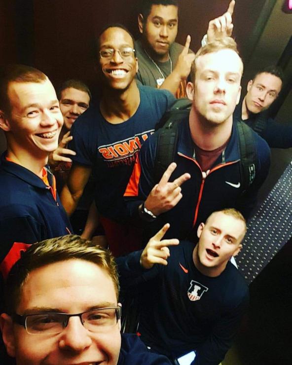 Teammates pose for a selfie. 