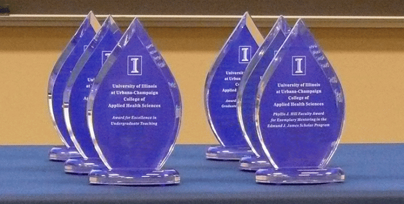 several flame-shaped acrylic awards